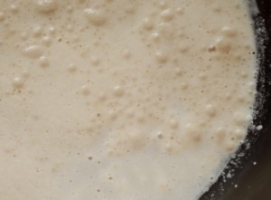 Yeast in bowl with water and honey
